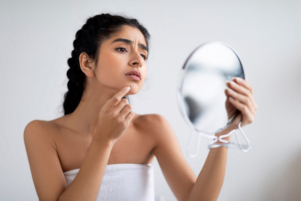 girl looking in mirror