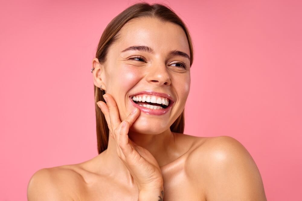 woman happy skincare